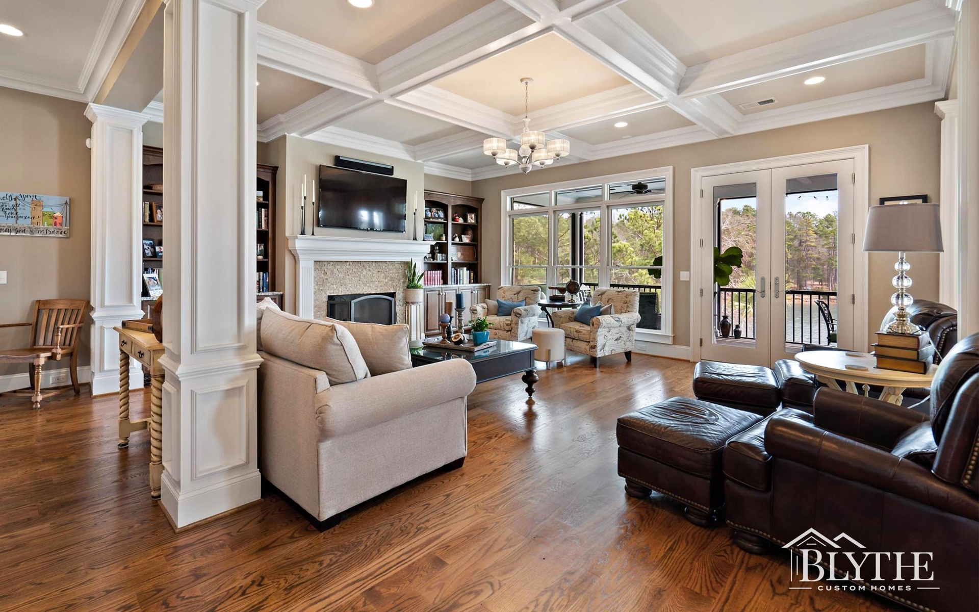 Blythe Custom Homes' Coffered Ceiling Great room with Lake View