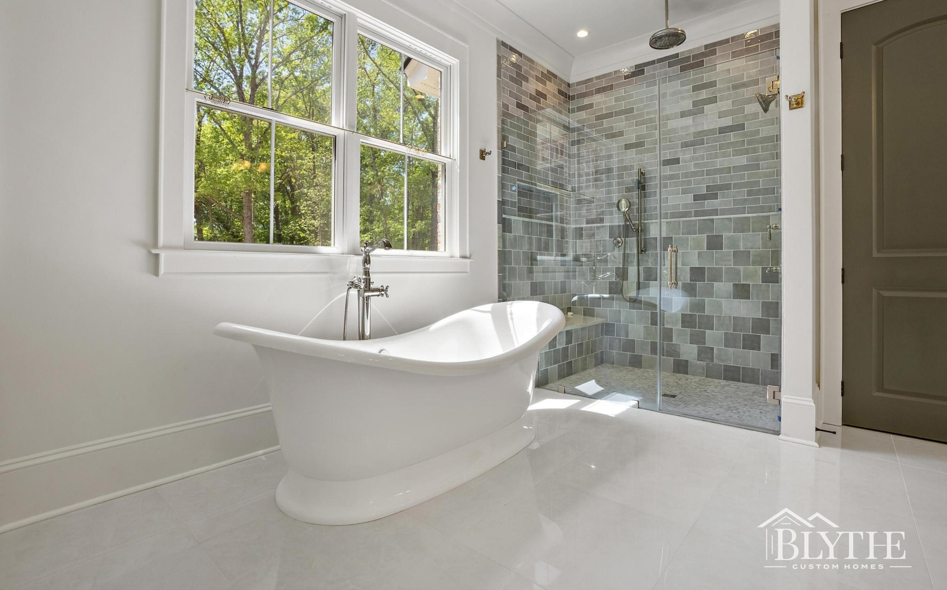 Blythe Custom Homes' Custom Tiled Shower & Sculptured Tub
