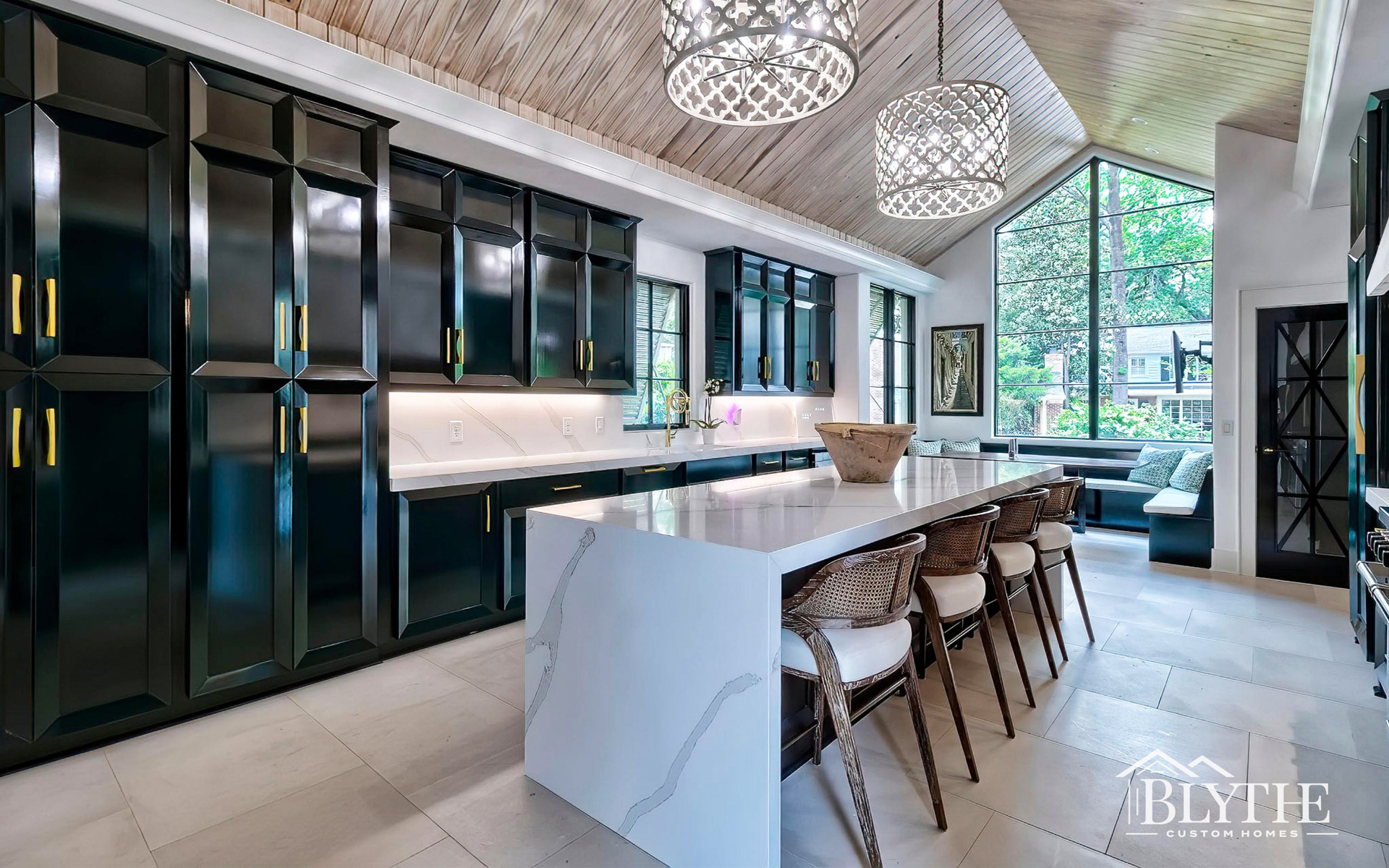 Blythe Custom Homes' Vaulted Cypress Ceiling & Waterfall Kitchen Island